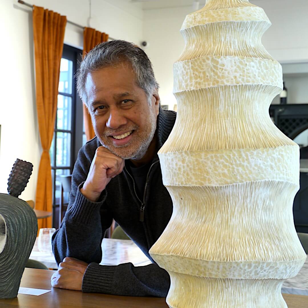 emil yanos with his sculputure